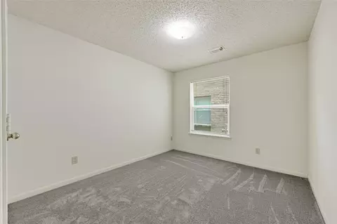 Bedroom - 8818 Driftstone Dr, Spring, TX 77379 photo 6 of 7