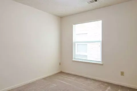 Bedroom - 8818 Driftstone Dr, Spring, TX 77379 photo 2 of 7