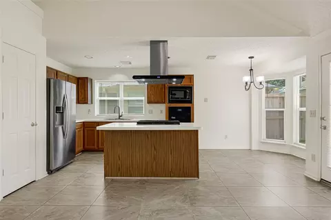 Kitchen - 8818 Driftstone Dr, Spring, TX 77379 photo 3 of 5
