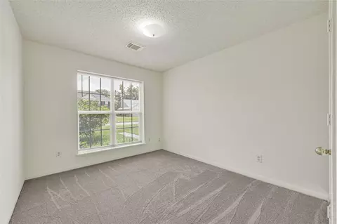 Bedroom - 8818 Driftstone Dr, Spring, TX 77379 photo 1 of 7