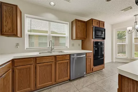 Kitchen - 8818 Driftstone Dr, Spring, TX 77379 photo 4 of 5