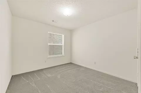 Bedroom - 8818 Driftstone Dr, Spring, TX 77379 photo 4 of 7