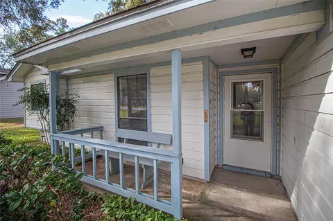 Exterior - 320 Bridgeview Dr, Onalaska, TX 77360 photo 3 of 9