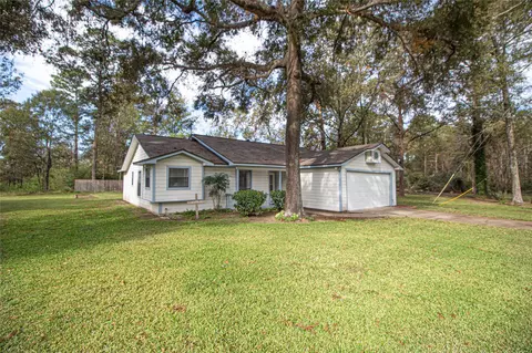 Exterior - 320 Bridgeview Dr, Onalaska, TX 77360 photo 1 of 9