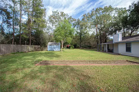 Exterior - 320 Bridgeview Dr, Onalaska, TX 77360 photo 7 of 9