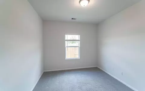 Bedroom - 4326 Maple Root Ln, Pinehurst, TX 77362 photo 2 of 3