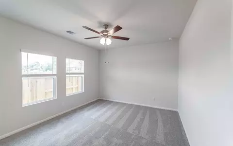 Bedroom - 4326 Maple Root Ln, Pinehurst, TX 77362 photo 3 of 3