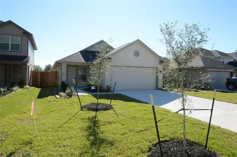 Exterior - 1319 Winding Willow Dr, Pinehurst, TX 77362 photo 2 of 5