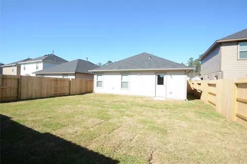 Exterior - 1319 Winding Willow Dr, Pinehurst, TX 77362 photo 5 of 5