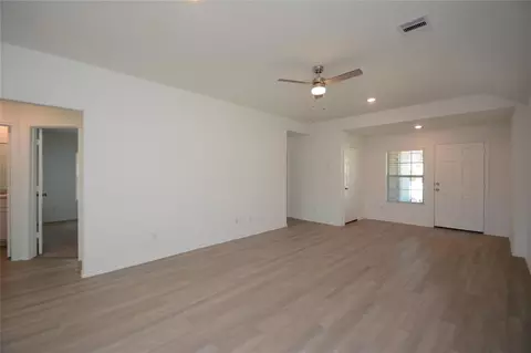 Living - 1319 Winding Willow Dr, Pinehurst, TX 77362 photo 2 of 3