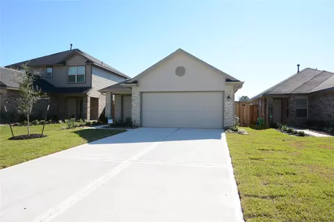 Exterior - 1319 Winding Willow Dr, Pinehurst, TX 77362 photo 3 of 5