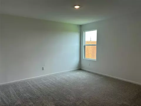 Bedroom - 557 Falling Cave Dr, Willis, TX 77378 photo 1 of 7
