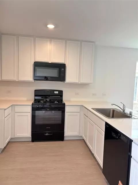 Kitchen - 557 Falling Cave Dr, Willis, TX 77378 photo 3 of 4