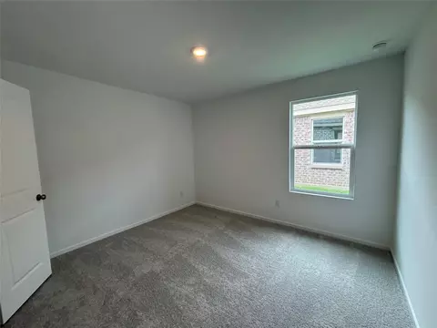 Bedroom - 557 Falling Cave Dr, Willis, TX 77378 photo 7 of 7