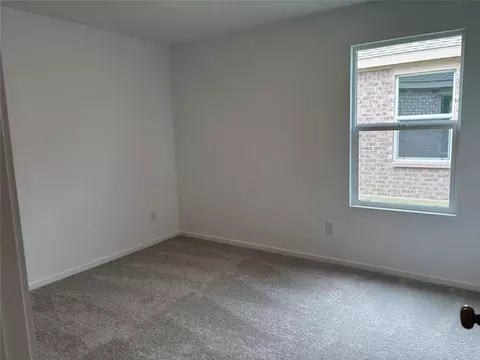 Bedroom - 557 Falling Cave Dr, Willis, TX 77378 photo 5 of 7