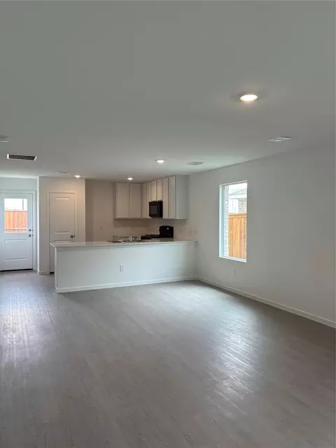 Living - 557 Falling Cave Dr, Willis, TX 77378 photo 4 of 6