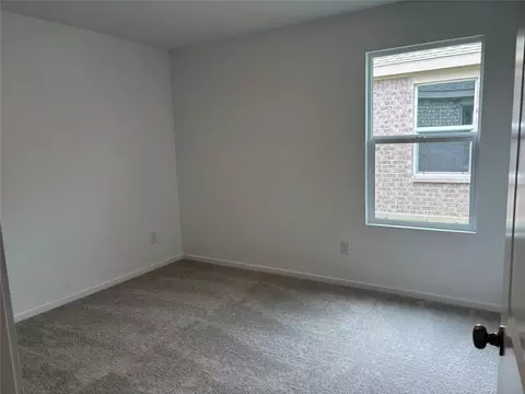 Bedroom - 557 Falling Cave Dr, Willis, TX 77378 photo 4 of 7