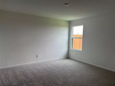 Bedroom - 557 Falling Cave Dr, Willis, TX 77378 photo 2 of 7