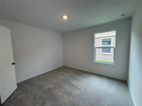 Bedroom - 557 Falling Cave Dr, Willis, TX 77378 photo 6 of 7