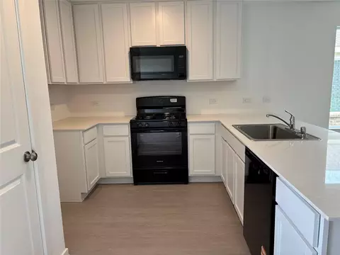 Kitchen - 557 Falling Cave Dr, Willis, TX 77378 photo 1 of 4