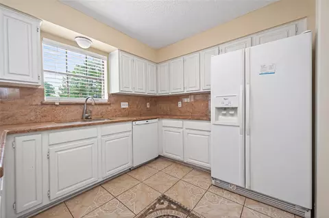 Kitchen - 30207 E Geneva Dr, Spring, TX 77386 photo 1 of 2