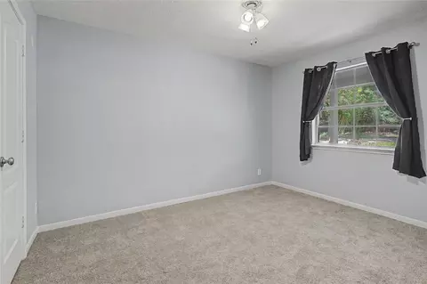 Bedroom - 14715 14719 Cedar Lane Loop, Willis, TX 77378 photo 4 of 5