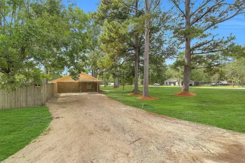 Exterior - 310 Spring Ave, Shepherd, TX 77371 photo 7 of 8