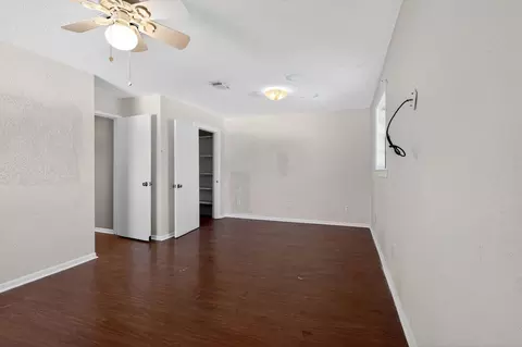 Bedroom - 712 E Peach St, Angleton, TX 77515 photo 4 of 13
