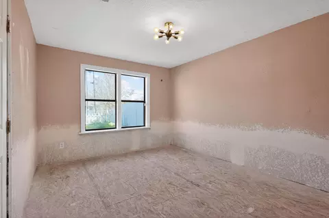 Bedroom - 712 E Peach St, Angleton, TX 77515 photo 8 of 13