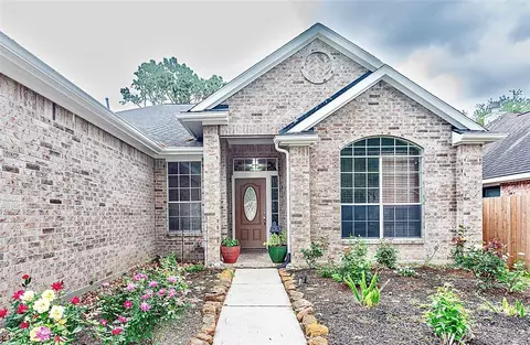 1727 Whispering Forest Dr, Kingwood, TX 77339