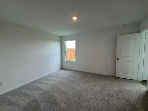 Bedroom - 521 Falling Cave Dr, Willis, TX 77378 photo 5 of 7