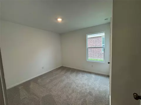 Bedroom - 521 Falling Cave Dr, Willis, TX 77378 photo 1 of 7