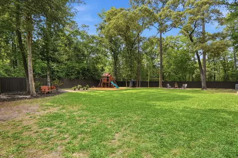Exterior - 1680 Beech Dr, Conroe, TX 77385 photo 9 of 12