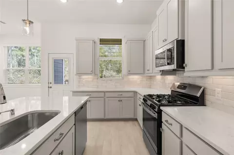 Kitchen - 532 Red Cascade Trl, Willis, TX 77318 photo 3 of 3