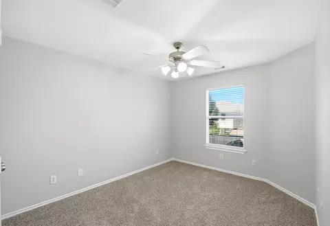 Bedroom - 21731 Chanas Ct, Spring, TX 77388 photo 5 of 7