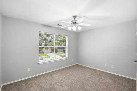 Bedroom - 21731 Chanas Ct, Spring, TX 77388 photo 2 of 7