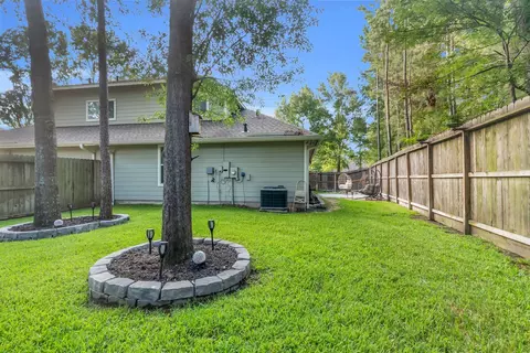 Exterior - 3 Darlinghurst Dr, Conroe, TX 77384 photo 4 of 7