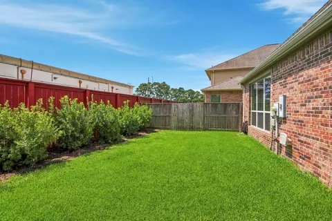 Exterior - 8931 Leaning Hollow Ln, Spring, TX 77379 photo 6 of 9