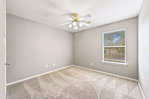 Bedroom - 6410 Sparrows Glen Ln, Spring, TX 77379 photo 5 of 8