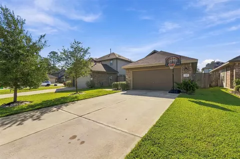 Exterior - 1207 Blue Hazel Ct, Pinehurst, TX 77362 photo 6 of 7