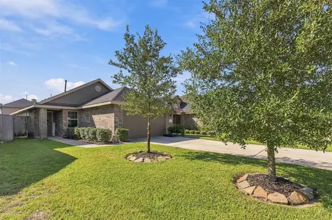 Exterior - 1207 Blue Hazel Ct, Pinehurst, TX 77362 photo 7 of 7