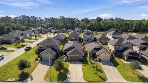 View/Area - 1207 Blue Hazel Ct, Pinehurst, TX 77362 photo 1 of 10