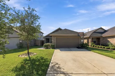 Exterior - 1207 Blue Hazel Ct, Pinehurst, TX 77362 photo 5 of 7