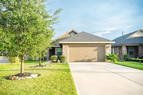 Exterior - 1207 Blue Hazel Ct, Pinehurst, TX 77362 photo 3 of 7