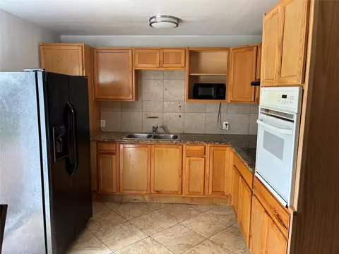 Kitchen - 828 N Chenango St, Angleton, TX 77515 photo 1 of 3