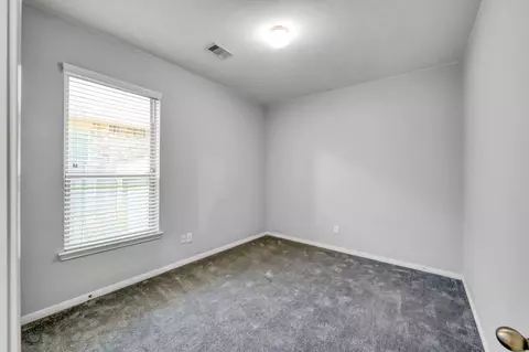 Bedroom - 5615 Glenfield Spring Ln, Spring, TX 77389 photo 2 of 4
