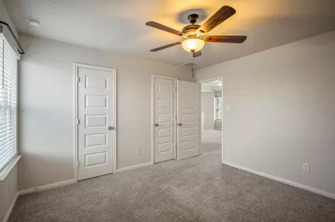 Bedroom - 2355 Mount Locke Path, Conroe, TX 77301 photo 9 of 10