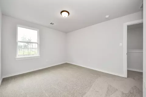 Bedroom - 18724 Loom Dr, Conroe, TX 77306 photo 11 of 13