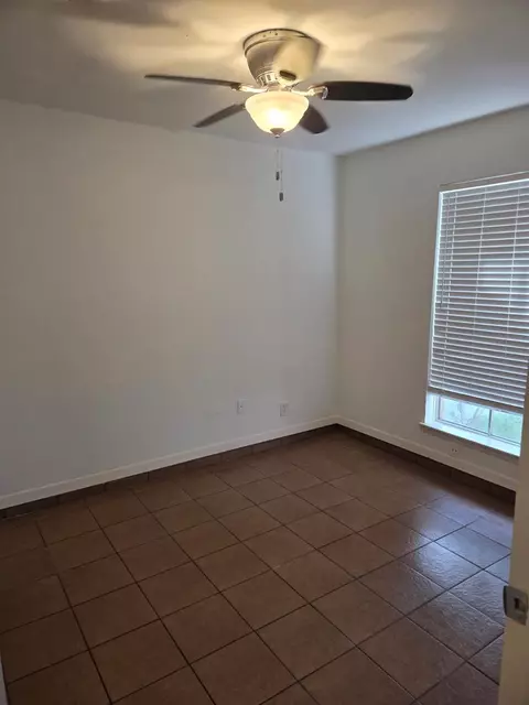 Bedroom - 5510 NW Circlegate Dr NW, Spring, TX 77373 photo 2 of 3