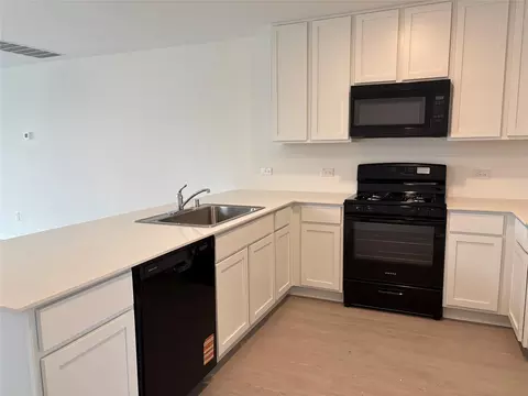 Kitchen - 553 Falling Cave Dr, Willis, TX 77378 photo 7 of 11